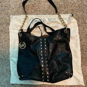 Michael Kors Black shoulder bag with gold studs